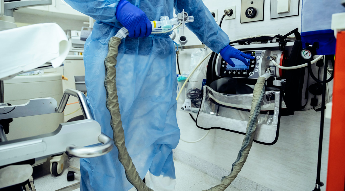 Podcast Who Gets Ventilator Close-up of doctor in emergency room of a hospital with respiratory equipment