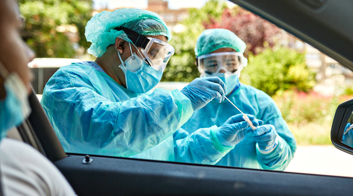 Technicians getting ready to do a swab test