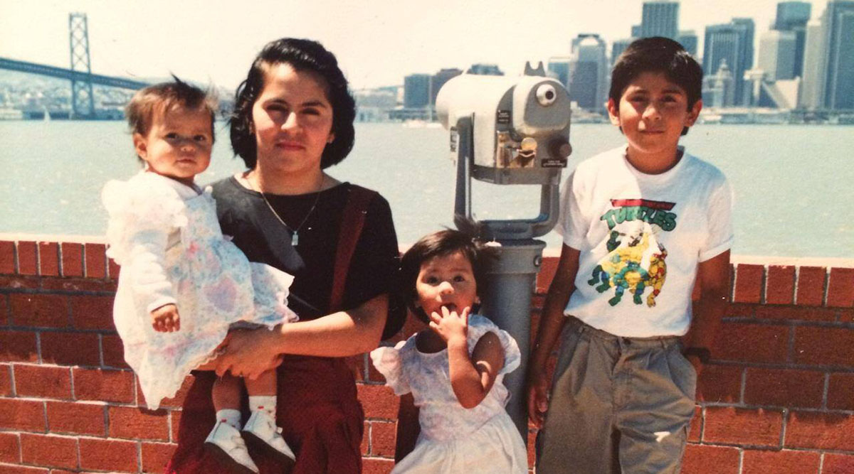 Denisse Rojas Marquez, MD, MPP, with her mother and siblings as an infant.