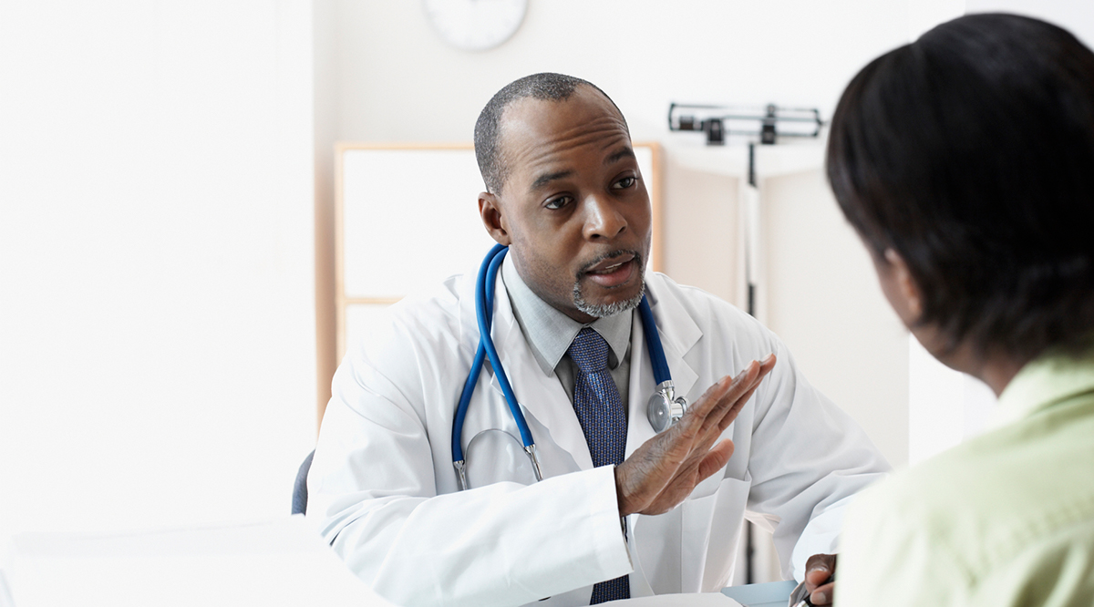 Doctor talking with patient