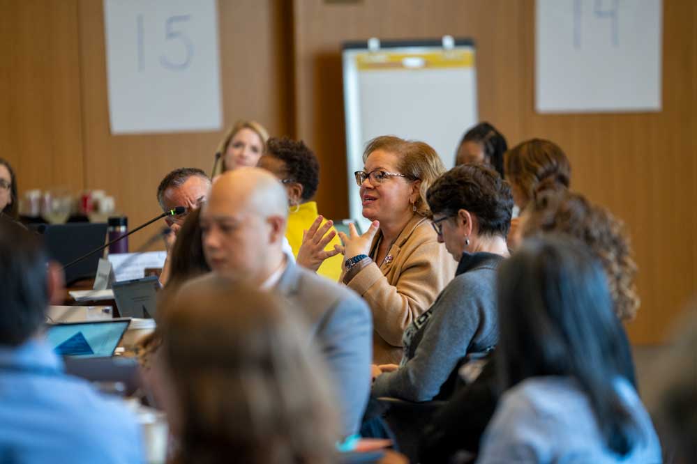 A woman participates in leadership development programming.