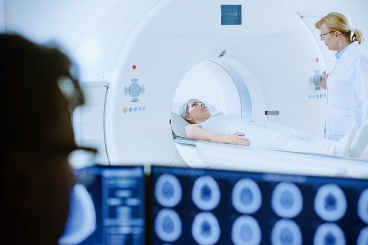 Patient undergoes MRI or CT scan process Patient undergoes MRI or CT scan process