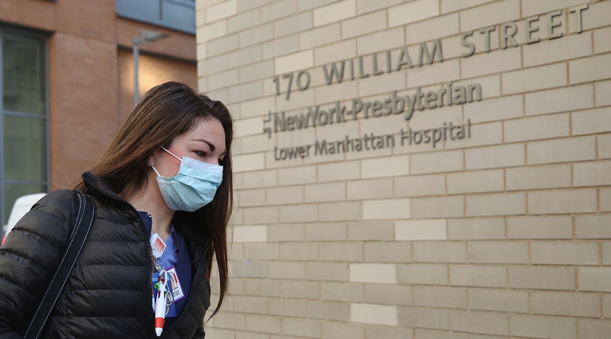 An employee of NewYork-Presbyterian Lower Manhattan Hospital arrives for work on April 02, 2020 in New York City.