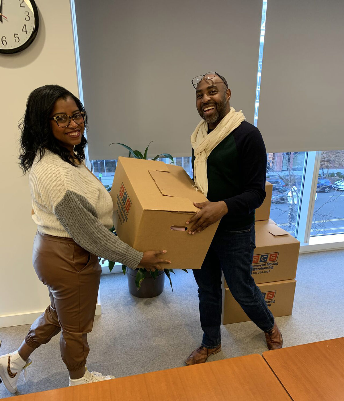 At a staff retreat, employees pack grounding bags for clients in So Others Might Eat (SOME) outpatient mental health programs.