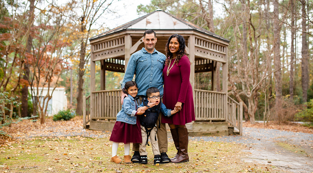 Eric and Nazira Kelly pose with their children, Zara and Ezra, in North Carolina.