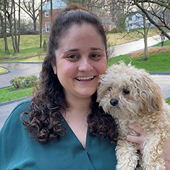 Jessi Gold, MD, with her dog Winnie, who provides lots of emotional support.