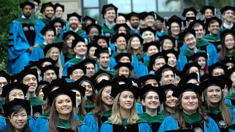 Students in graduation caps and gowns