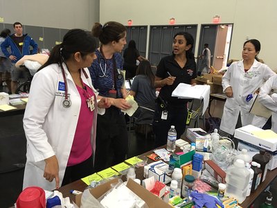 Shital Patel, MD, from Baylor College of Medicine and other medical professionals treated patients who took shelter at George R. Brown Convention Center in Houston after Hurricane Harvey. Credit: Baylor College of Medicine. Shital Patel and other medical professionals treated patients who took shelter at George R. Brown Convention Center in Houston after Hurricane Harvey.