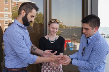 At the University of Wisconsin, a graduating medical student passes heirloom seeds to the next class for a traditional Native American garden. Credit:Todd Brown, University of Wisconsin School of Medicine and Public Health aamc-news-native-american-curriculum-inline.jpg