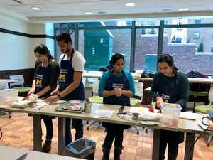 culinary medicine students chopping food