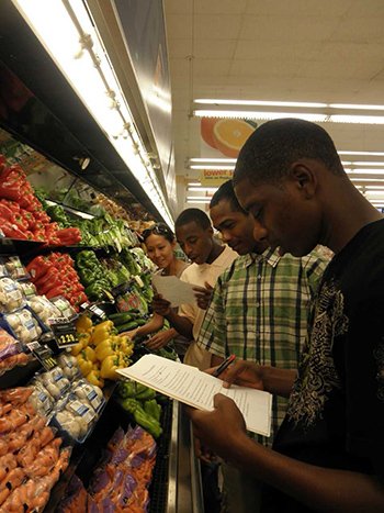 four students doing an assignment