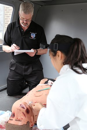 Mark Bowyer, MD, oversees a medical student administering care to a simulated trauma patient at Uniformed Services University of the Health Sciences in Bethesda, Md. Photo: Uniformed Services University Mark Bowyer, MD, oversees a medical student administering care to a simulated trauma patient.
