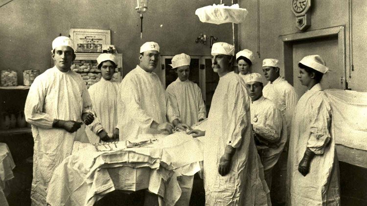 A group of doctors and nurses are ready for surgery at Bellevue.