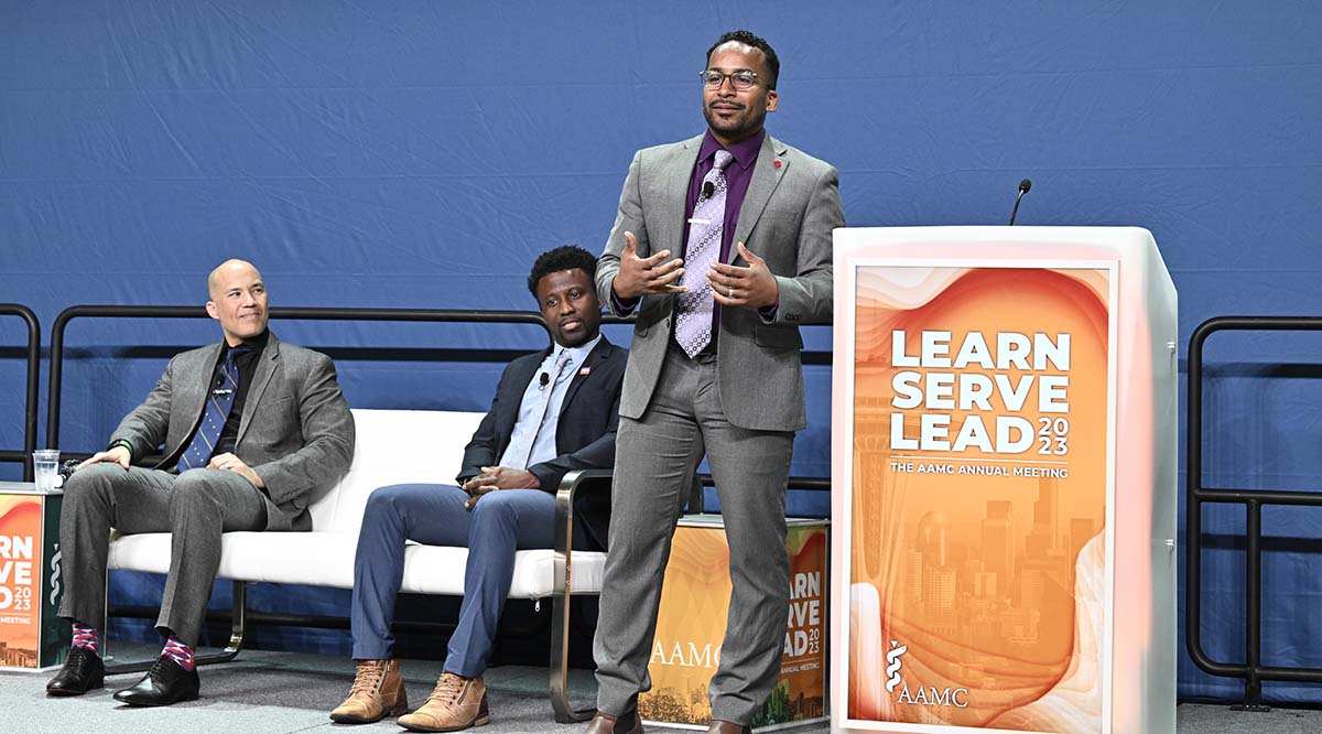 Stanley Andrisse, PhD, MBA, James Earl Harris Jr., MD, and Antwione M. Haywood, PhD, on stage during Learn Serve Lead 2023. 