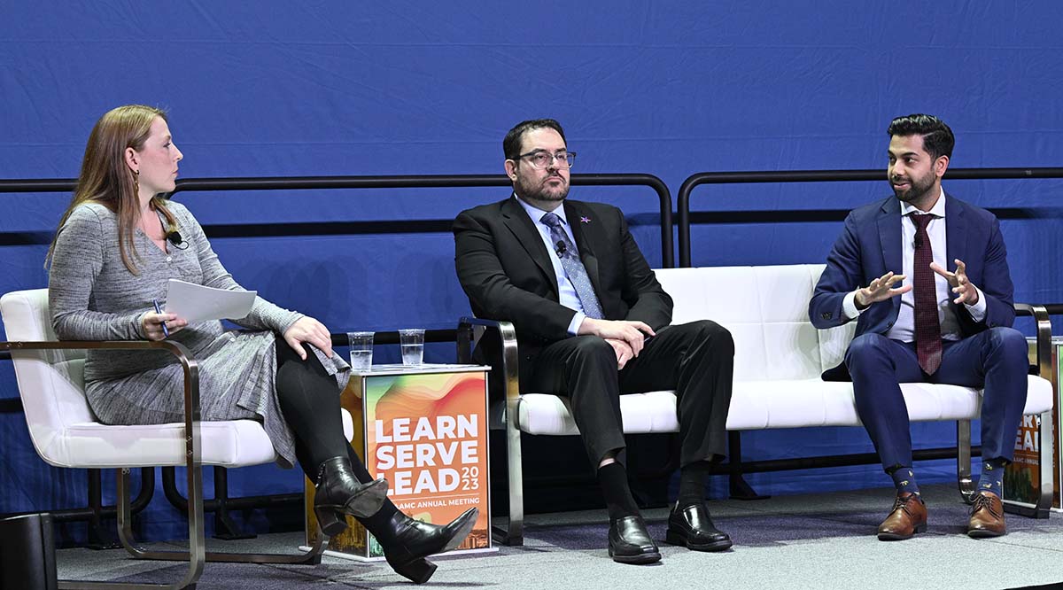 Dr. Joseph Sakran and Dr. Chethan Sathya speak on stage during Learn Serve Lead 2023