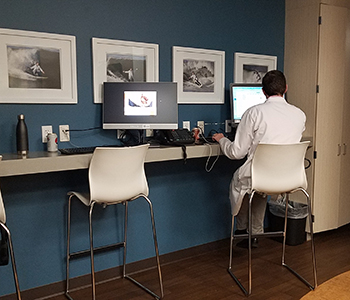 A man at a desk at Loma Linda University Health.