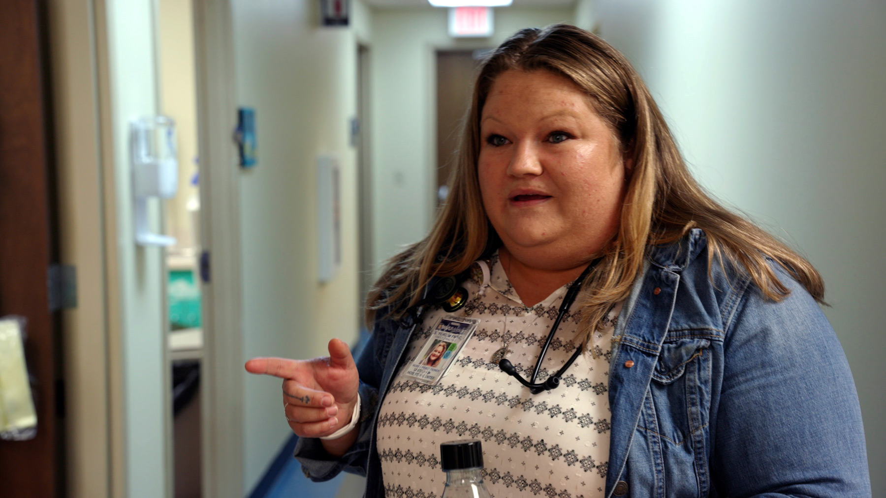 Shaunna Yokum is standing in the hallway of the WVU clinic