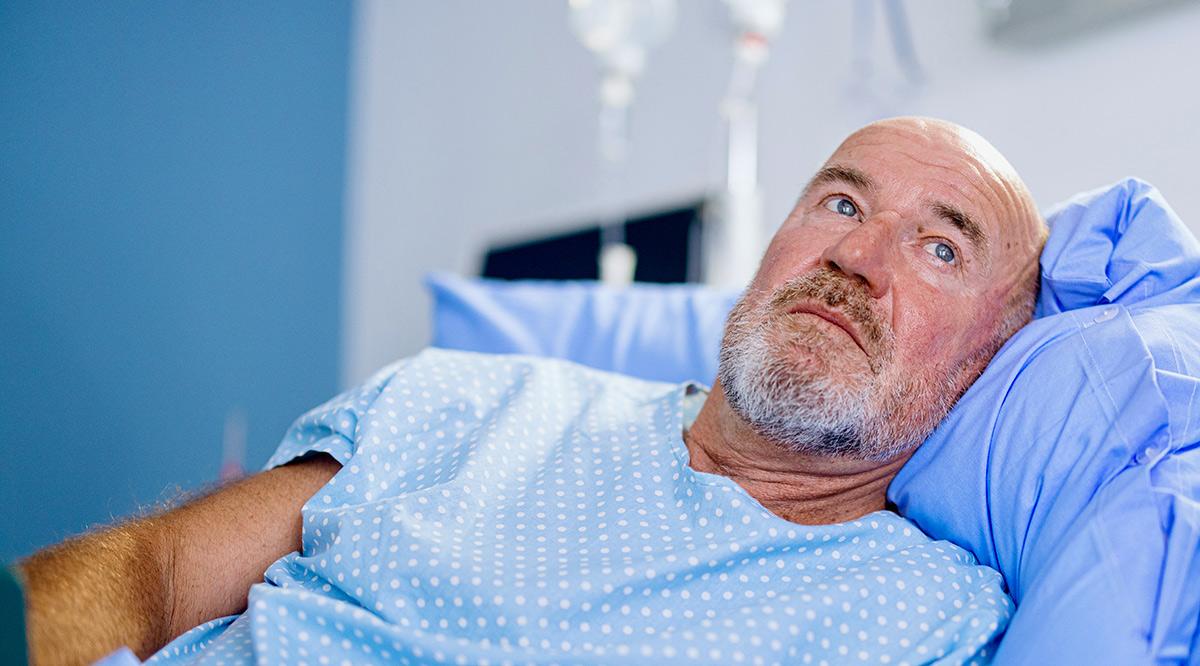 Male patient lying in the bed