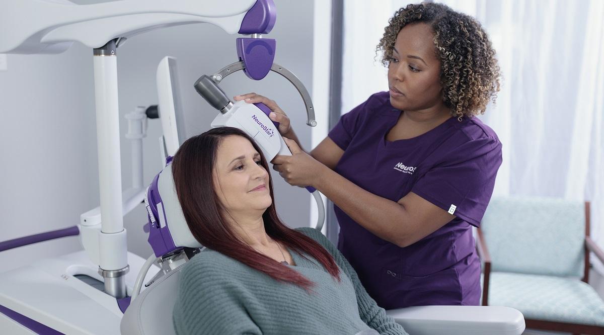 In transcranial magnetic stimulation (TMS), an external device is used to drive electromagnetic pulses through the skull to improve mood.