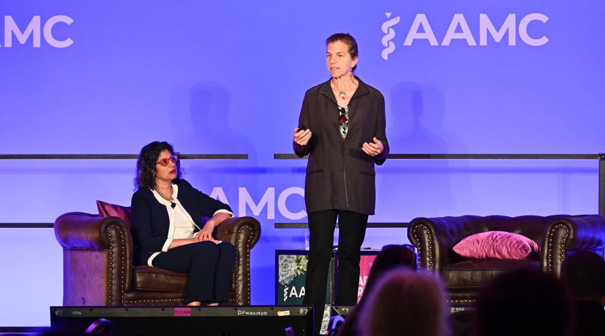 Allison Pugh, PhD, professor of sociology at Johns Hopkins University, addresses the audience as moderator Susmita Pati, MD, MPH, looks on during a session entitled Seeing the Other: Human Value in the Age of AI at Learn Serve Lead 2025: The AAMC Annual Meeting on Nov. 2 in San Antonio.