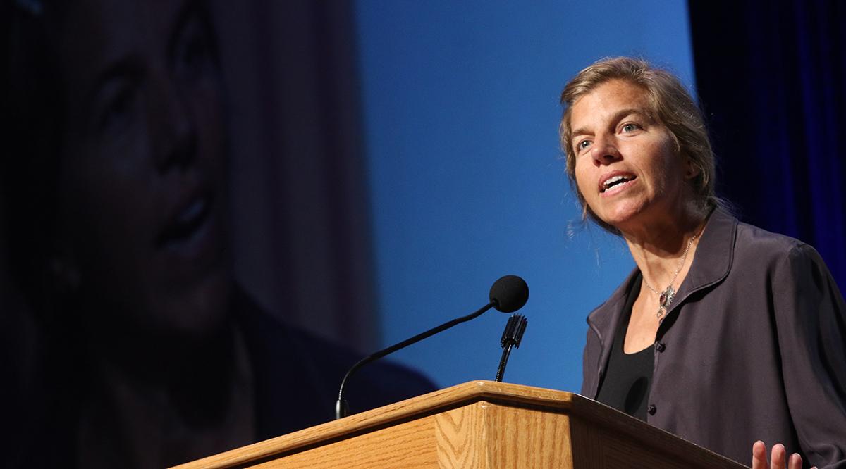 Allison Pugh, PhD, speaks at a conference of the American Sociological Association.