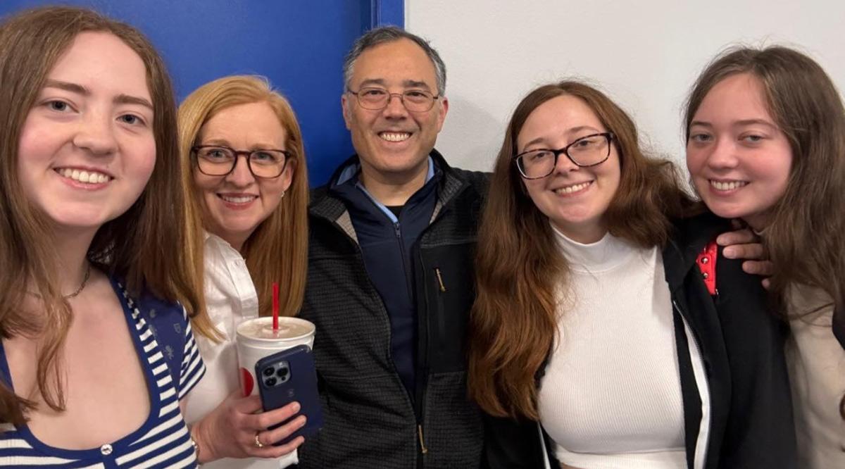 Cancer survivor Leonard Marquez, center, is pictured here with his wife, Jennifer, second from left, and his daughters, Abby, far left; Ellie, second from right; and Caroline, far right.