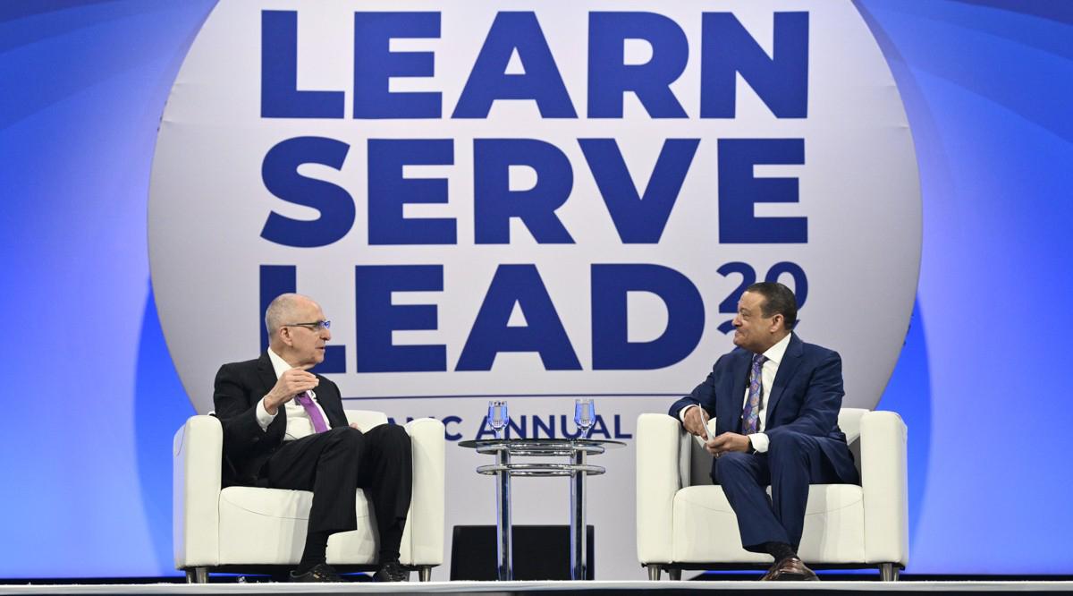 AAMC President and CEO David J. Skorton, MD, and AAMC Board Chair Lee Jones, MD, chat with the audience and each other after delivering their leadership speeches at Learn Serve Lead 2024: The AAMC Annual Meeting on Nov. 10 in Atlanta.