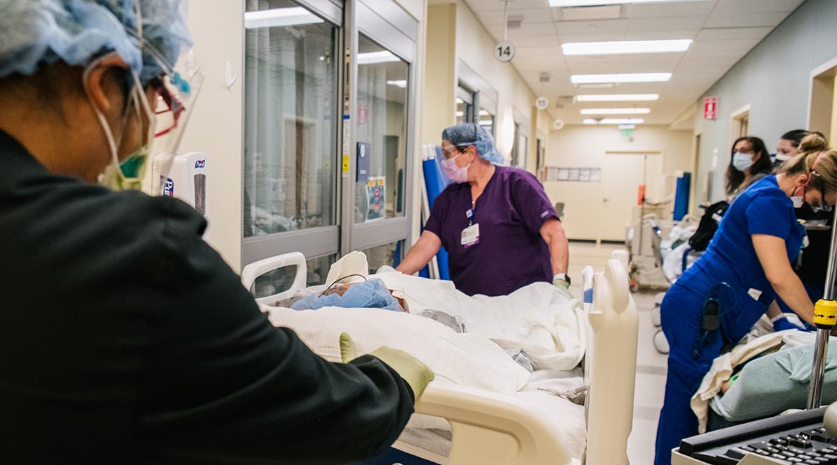 Emergency Room nurses tend to patients in a hallway at the Houston Methodist The Woodlands Hospital on August 18, 2021 in Houston, Texas.
