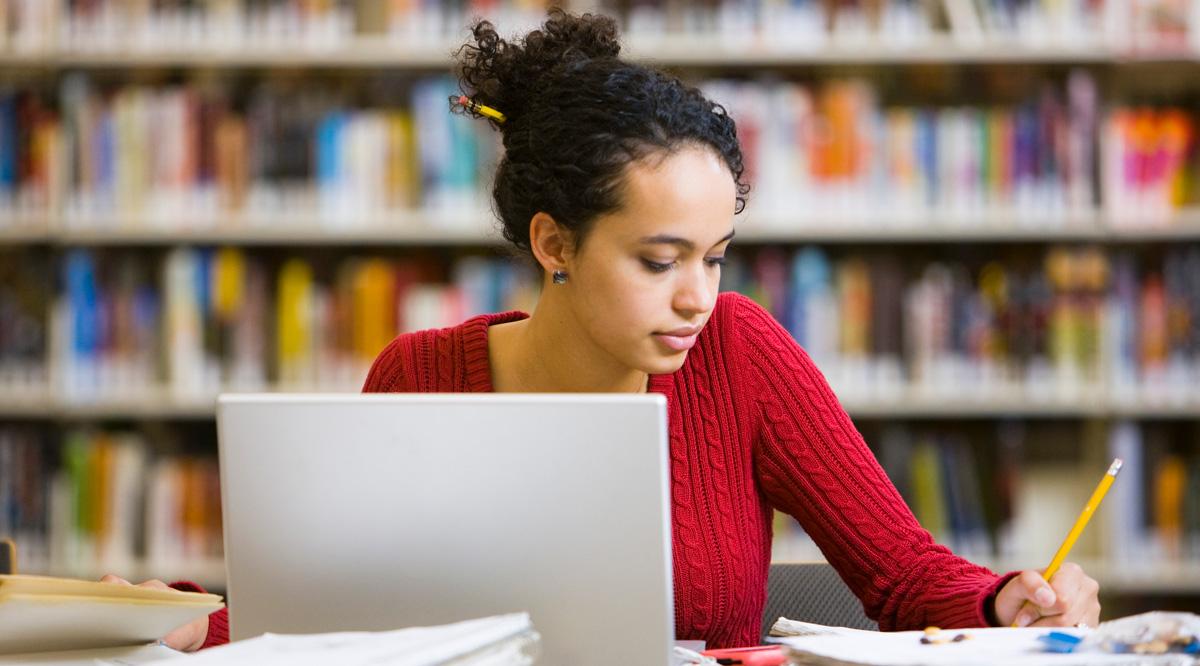 Woman studying in the library