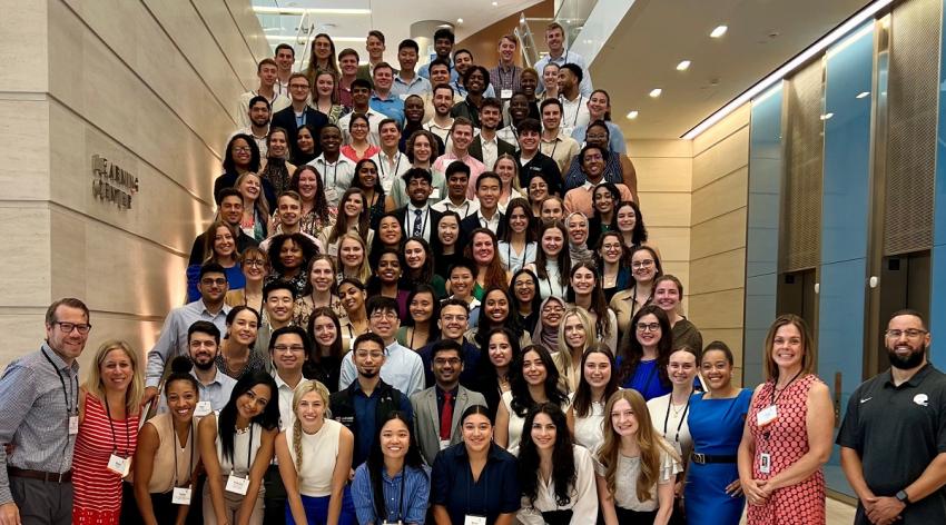 Future leaders in academic medicine pose on the steps of the learning center