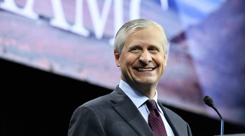 Jon Meacham speaks at a podium at Learn Serve Lead 2019