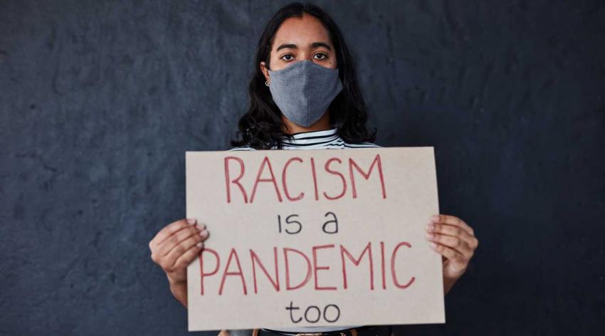 woman holding sign