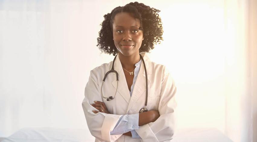 A Black woman doctor facing forward