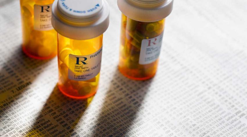 three pill bottles