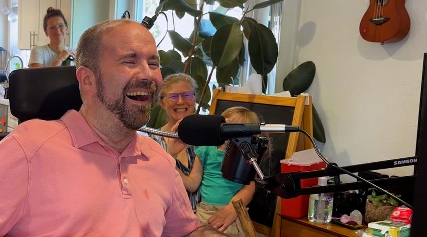 Casey Harrell weeps with joy after using a brain-computer interface created at UC Davis Health that enabled him to speak for the first time in years.