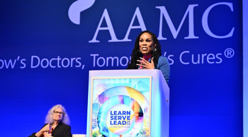 Emergency medicine physician Uché Blackstock, MD, discusses racism in medicine while Arline Geronimus, ScD, professor of health behavior and health education at the University of Michigan, looks on.