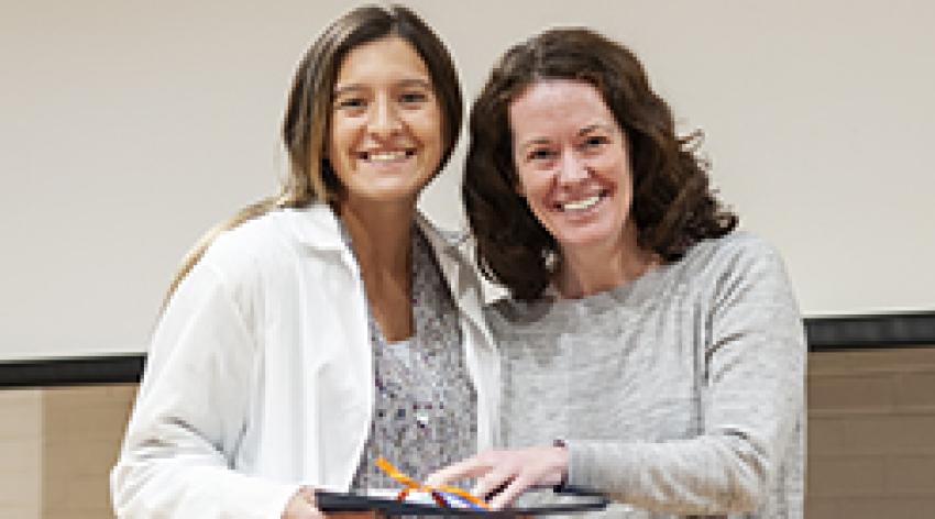 Audrey Putelo, a graduate student at UVA, and Melanie Rutkowski, PhD, associate professor of Microbiology, Immunology, and Cancer Biology at the University of Virginia (UVA), pose for a photo.