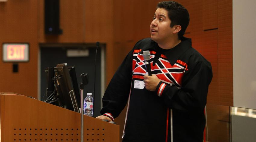 Alec Calac, president of the Association of Native American Medical Students at the University of California (UC), San Diego, School of Medicine, speaks at the medical school in 2019.