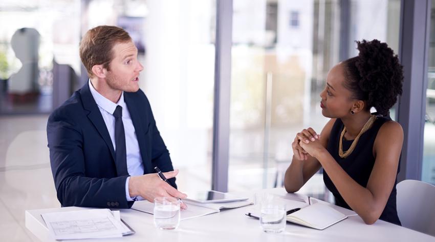 Businesspeople having a meeting in a boardroom