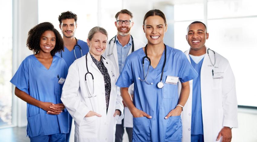 Portrait of a diverse team of doctors standing together in a hospital