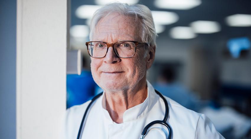Doctor with stethoscope in hospital clinic