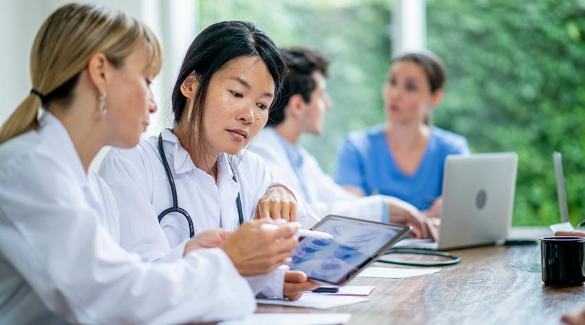 Group of medical students learn and listen in class