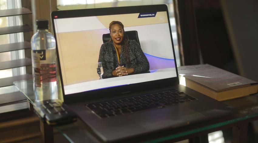 Heather McGhee appears on a laptop