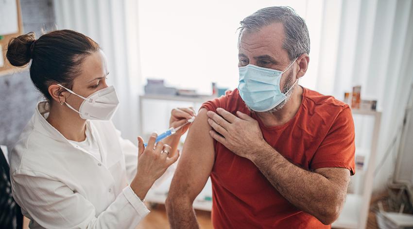 A man getting a coronavirus vaccine