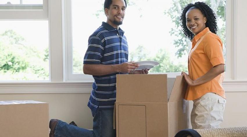 Couple unpacking new home