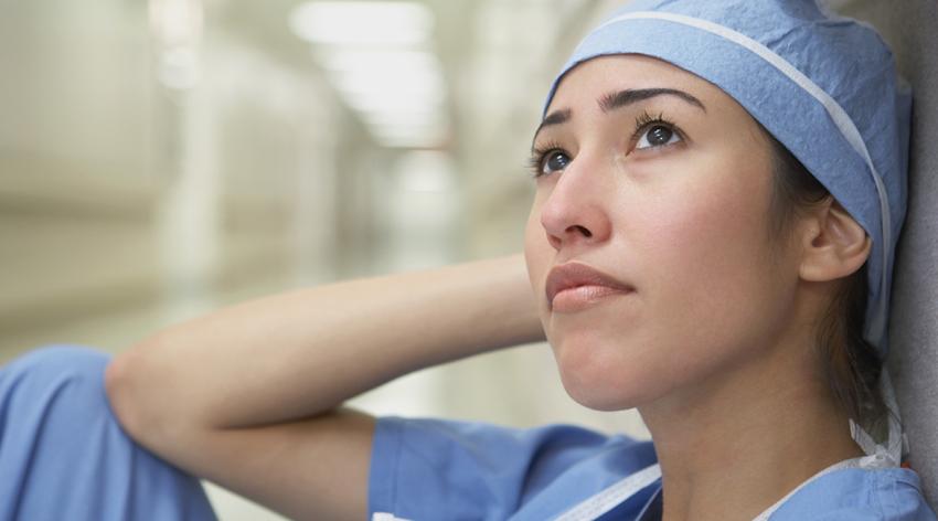 A woman in scrubs