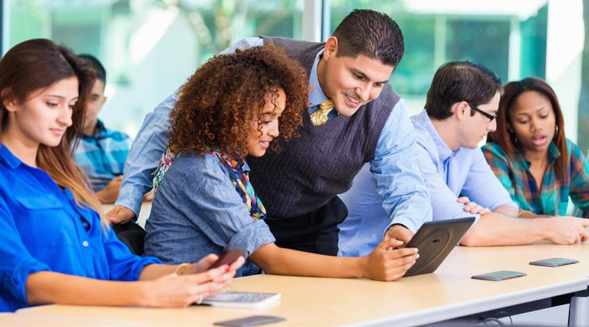 a teacher instructs a student