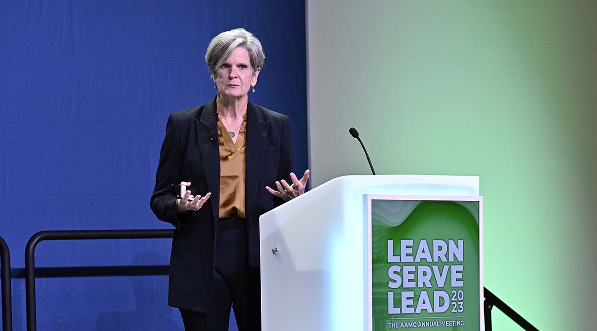 Dr. Wendy Dean, psychiatrist and health care advocate, speaks on stage during Learn Serve Lead 2023.